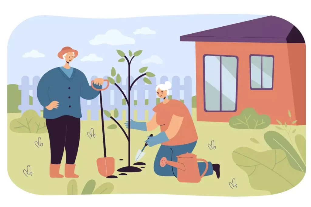 Empregada doméstica aposentada cuidando do jardim com uma senhora, plantando uma árvore na frente de sua casa florida.