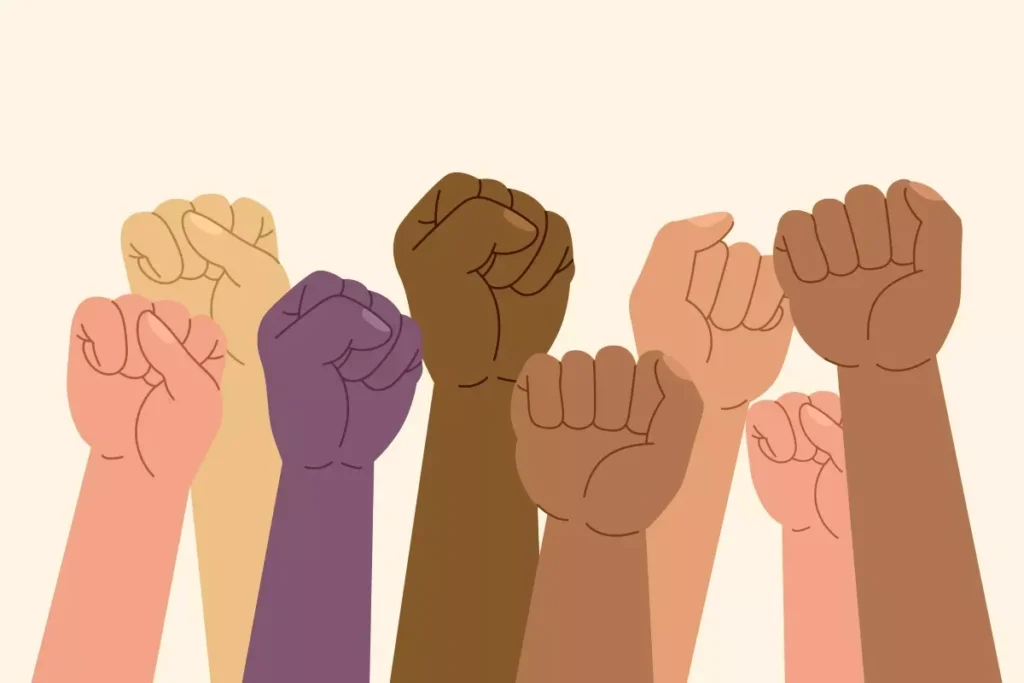 Diversas mãos de diferentes tons de pele juntas formando um movimento de união, representando a força dos sindicatos das domésticas no Brasil.