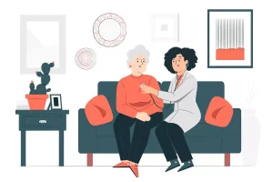 Imagem de uma cuidadora conversando com idoso sentado no sofá, ilustrando os direitos e deveres dos cuidadores de idosos, ambiente acolhedor e confortável.